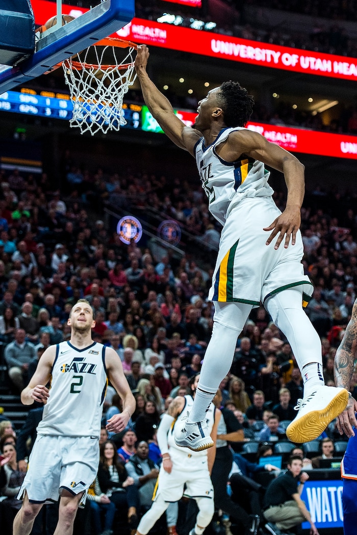 (Chris Detrick  |  The Salt Lake Tribune)  Utah Jazz guard Donovan Mitchell (45) goes up for a dunk past New York Knicks forward Michael Beasley (8) during the game at Vivint Smart Home Arena Friday, January 19, 2018.  Utah Jazz guard Donovan Mitchell (45) missed the dunk. 