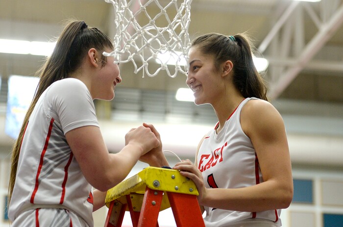 (Leah Hogsten  |  The Salt Lake Tribune) East's Lealani Falatea (03) and East's Desire Falatea celebrate the win.  East defeated Timpview 68-48 to win the the 5A High School Girls' Basketball Tournament title at SLCC in Taylorsville, Saturday, Feb. 24, 2018. 