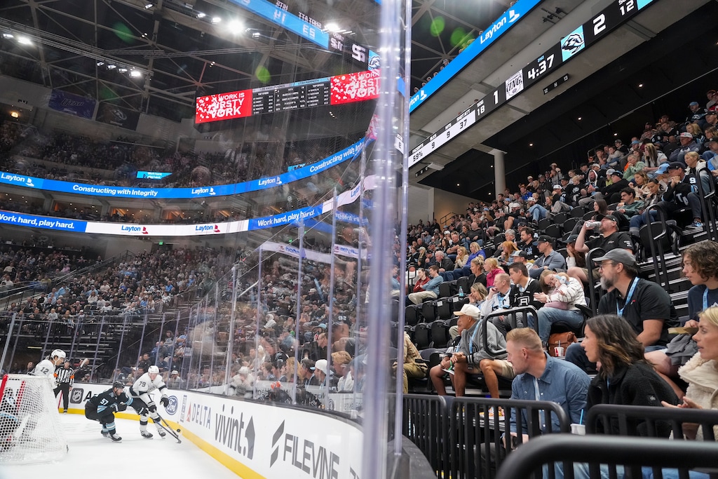 (Bethany Baker  |  The Salt Lake Tribune) Fans watch from the redesigned seating behind the goals during a preseason game for the Utah Mammoth at Delta Center in Salt Lake City on Thursday, Oct. 2, 2025.