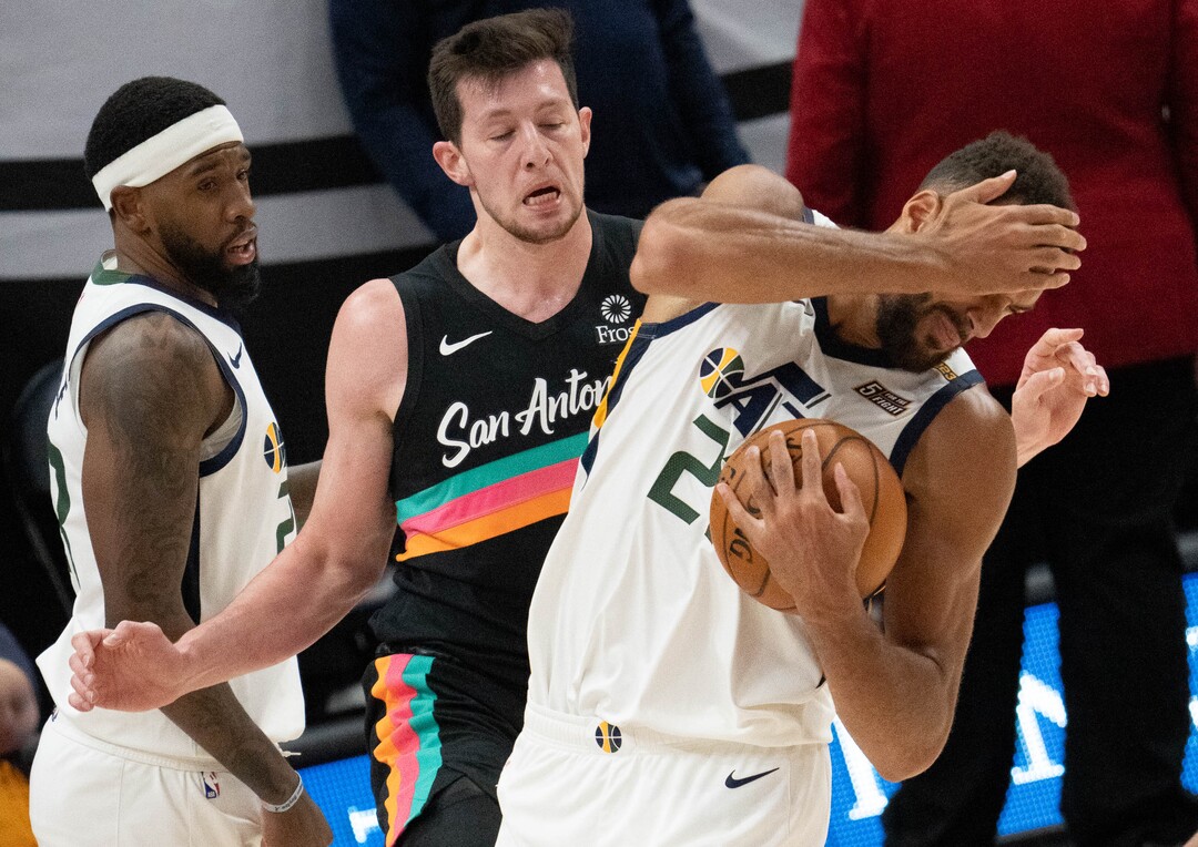 (Francisco Kjolseth | The Salt Lake Tribune) San Antonio Spurs forward Drew Eubanks (14) catches Utah Jazz center Rudy Gobert (27) in the eye in NBA action between the Utah Jazz and the San Antonio Spurs at Vivint Smart Home Arena, on Wednesday, May 5, 2021.