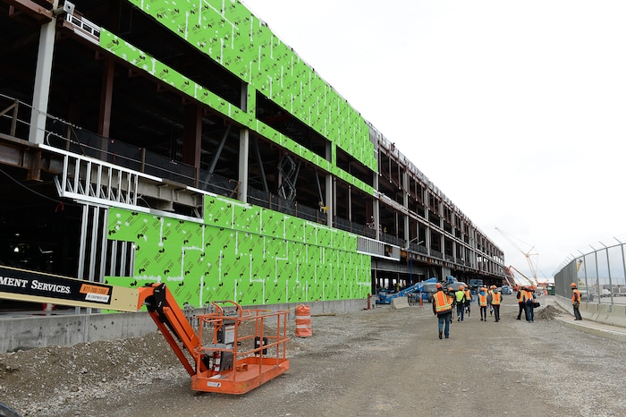(Francisco Kjolseth  |  The Salt Lake Tribune)  The Salt Lake City Department of Airports gives a tour of the progress being made to replace the three aging terminals with a single central terminal building. Over time, the existing terminal, parking garage and concourses will be completely demolished and replaced with an estimated completion date of 2025.