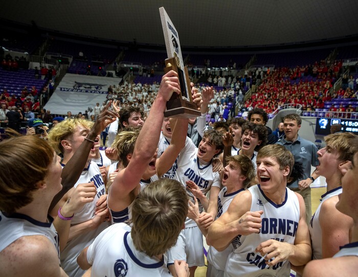 (Rick Egan | The Salt Lake Tribune) Corner Canyon celebrates thier win over the American Fork Cavemen, for  the Boys 6A State Championship at Weber State, on Saturday, March 4, 2023.
