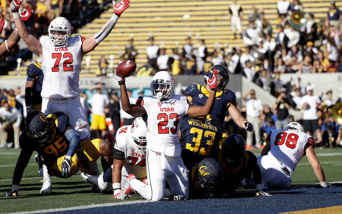 Utah running back Armand Shyne (23) celebrates after scoring on a 4-yard rushing touchdown against California during the first half of an NCAA college football game Saturday, Oct. 1, 2016, in Berkeley, Calif. (AP Photo/Marcio Jose Sanchez)