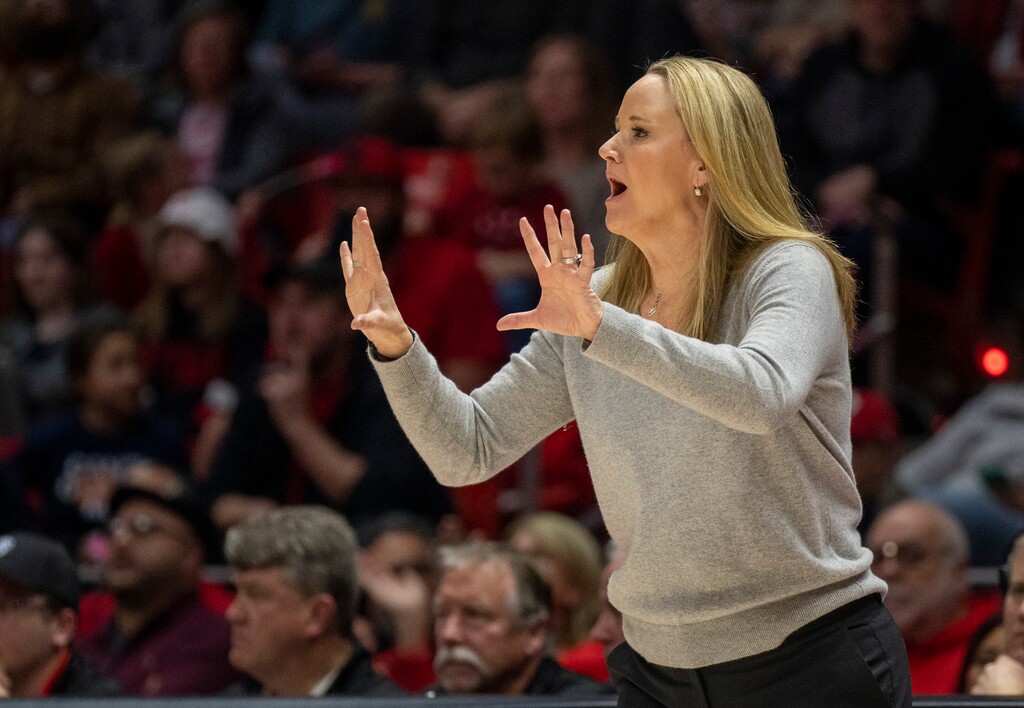 (Rick Egan | The Salt Lake Tribune)  Utah Utes head coach Lynne Roberts gives instructions to her team, in basketball action at the Jon M. Huntsman Center, on Friday, Feb. 16, 2024.