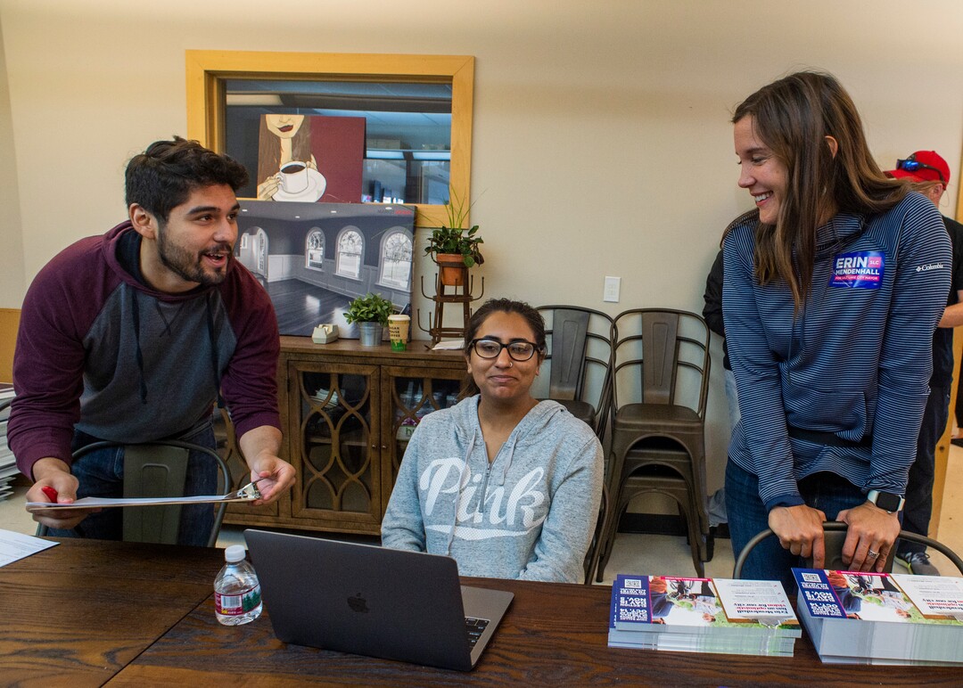 (Rick Egan  |  The Salt Lake Tribune)      Luigi Guadarrama and Lhyba Qazi meet with Salt Lake City Mayor candidate Erin Mendenhall at her campaign headquarters, Saturday, Sept. 21, 2019.