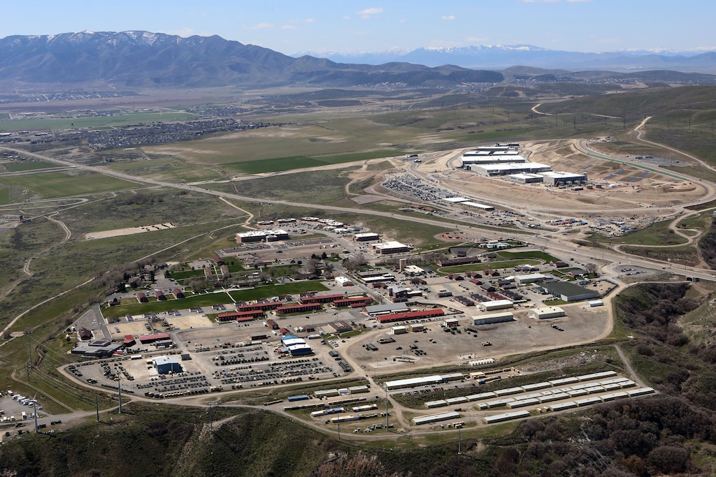 (Francisco Kjiolseth  |  Tribune file photo) Over the past decade, residential development has grown increasingly close to Utah National Guard's Camp Williams, pictured in the foreground with Saratoga Springs in the distance.
