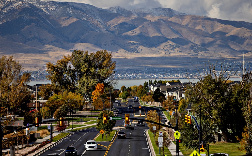 (Kim Raff for The New York Times) A view of Vineyard in October 2024 looking toward Utah Lake.
