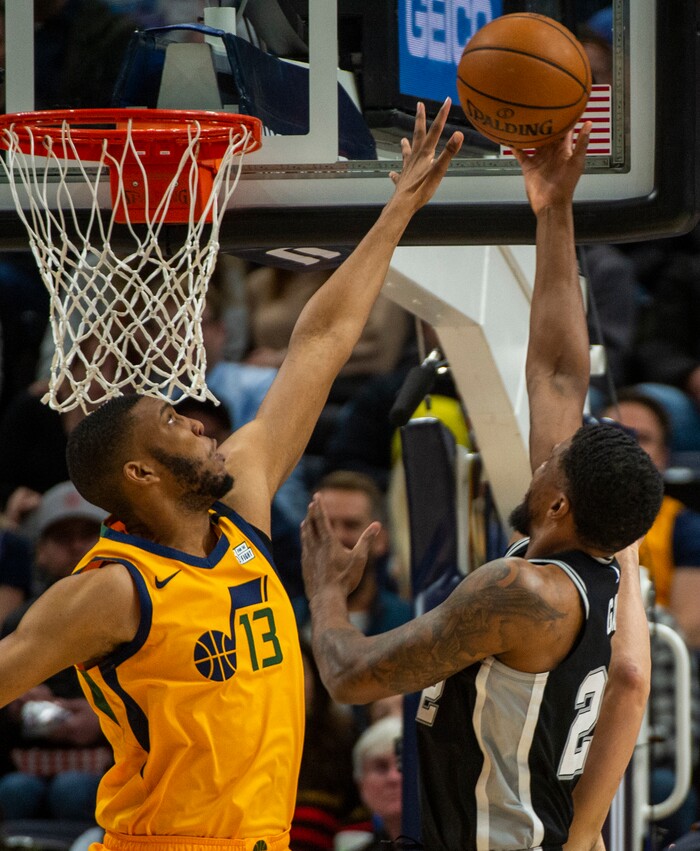 (Rick Egan  |  The Salt Lake Tribune)    
Utah Jazz center Tony Bradley (13) blocks a shot by San Antonio Spurs forward Rudy Gay (22), in NBA action between the Utah Jazz and the San Antonio Spurs, in Salt Lake City, Friday, Feb. 21, 2020.
