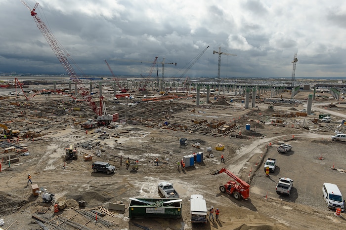 (Francisco Kjolseth  |  The Salt Lake Tribune)  The Salt Lake City Department of Airports gives a tour of the progress being made to replace the three aging terminals with a single central terminal building. Over time, the existing terminal, parking garage and concourses will be completely demolished and replaced with an estimated completion date of 2025.