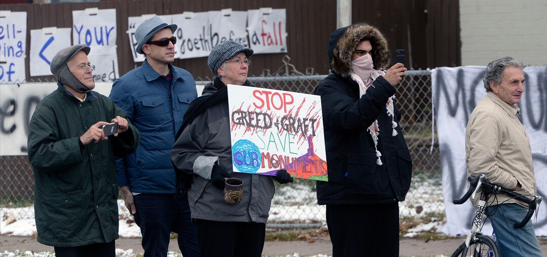(Al Hartmann  |  The Salt Lake Tribune) 	Crowds protest President Donald Trump outside LDS Welfare Square at 700 S. 800 W. as he tours the facility with church leaders Monday Dec 4. 