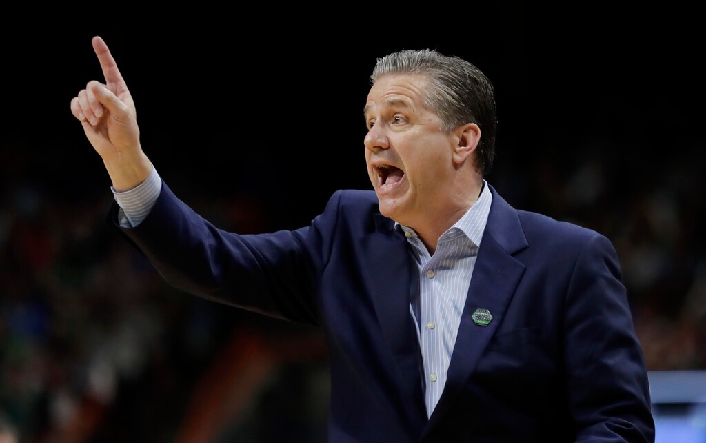 Kentucky head coach John Calipari calls to his team during the first half of a second-round game against Buffalo in the NCAA men's college basketball tournament Saturday, March 17, 2018, in Boise, Idaho. (AP Photo/Ted S. Warren)