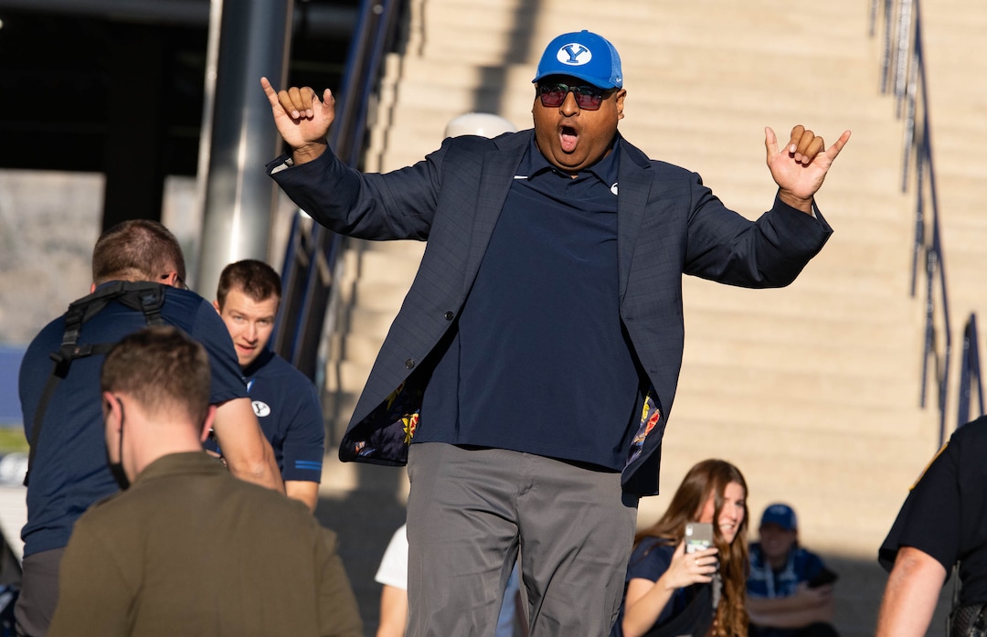 (Francisco Kjolseth | The Salt Lake Tribune) Brigham Young Cougars head coach Kalani Sitake gets the fans excited as they enter LaVell Edwards Stadium in Provo, Saturday, Sept. 25, 2021, for their game against South Florida.