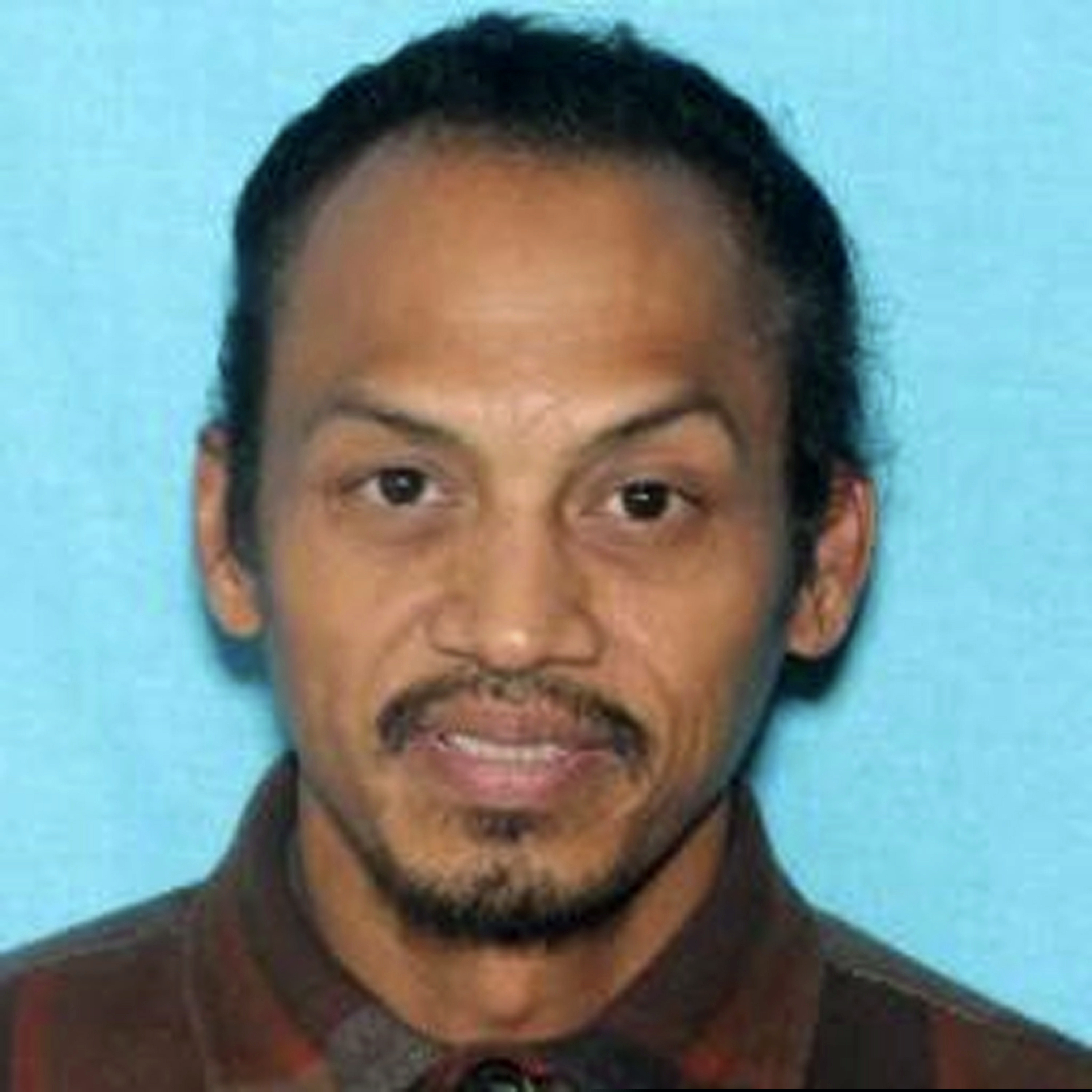 (Idaho State Police via AP) This undated booking photo provided by the Idaho State Police shows Jonathan Llana. A search was underway Thursday, May 23, 2019, in southern Idaho for Llana, suspected of shooting and killing a motorist on a Utah highway, Idaho State Police said in a statement.