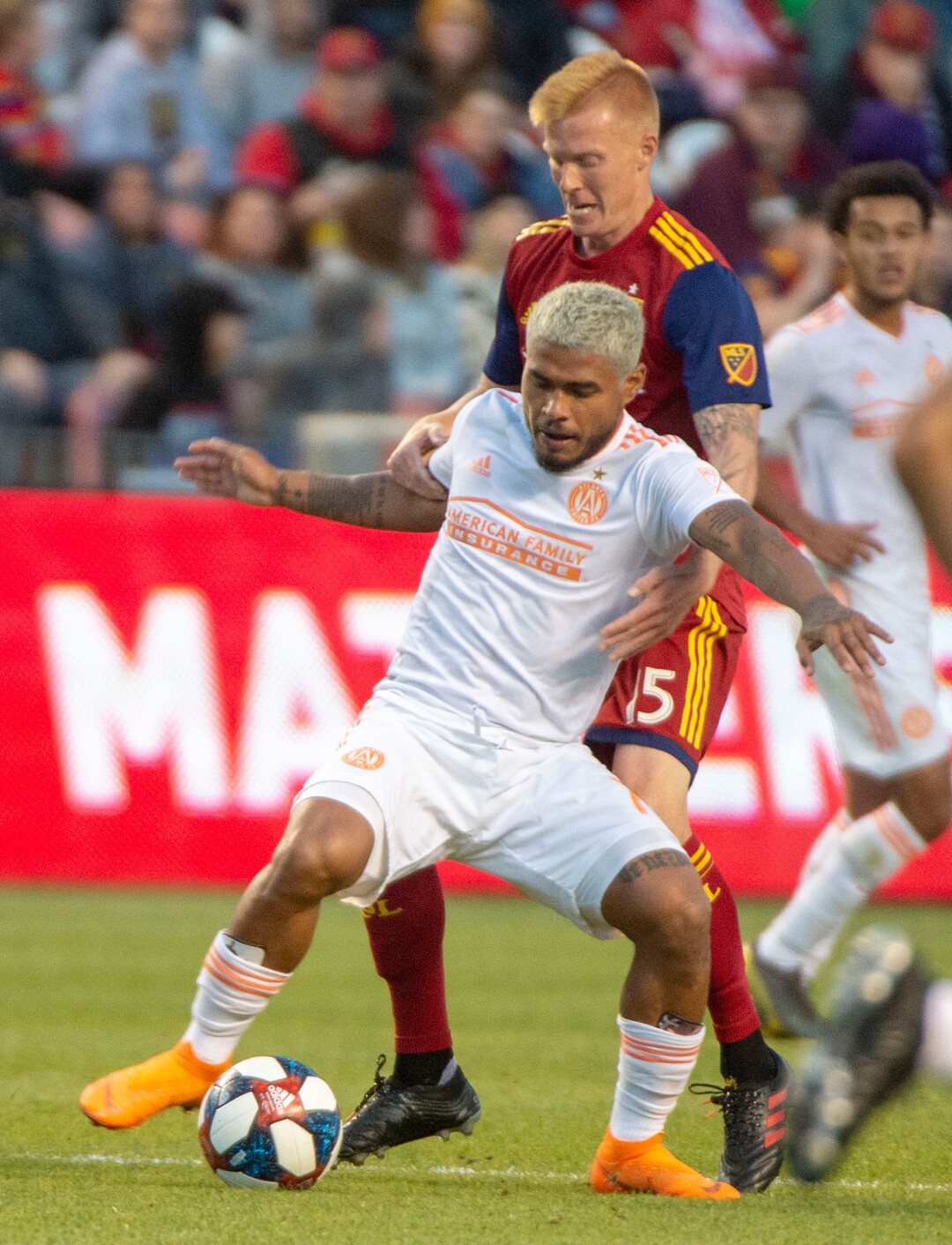 (Rick Egan  |  The Salt Lake Tribune).  Atlanta United forward Josef Martinez (7) goes for then ball along with Real Salt Lake defender Justen Glad (15), in MLS soccer action between Real Salt Lake and Atlanta United at Rio Tinto Stadium in Sandy, Friday, May 24, 2019.