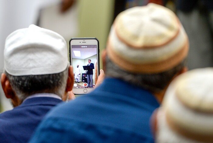 Leah Hogsten  |  The Salt Lake Tribune  Utah Islamic Center members listen as U.S. Senate candidate Mitt Romney addresses the congregation, Oct. 26, 2018, before Friday special prayers.