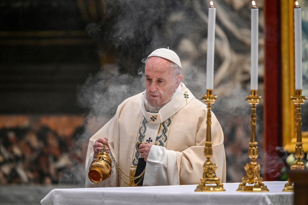 (Vincenzo Pinto/Pool Photo via AP, File) In this Nov. 22, 2020, file photo, Pope Francis incenses the altar as he celebrates Mass on the occasion of the Christ the King festivity, in St. Peter's Basilica at the Vatican.
