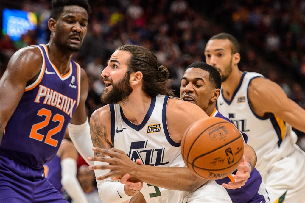 (Trent Nelson | The Salt Lake Tribune)  Phoenix Suns guard De'Anthony Melton (14) knocks the ball away from Utah Jazz guard Ricky Rubio (3) as the Utah Jazz host the Phoenix Suns, NBA basketball in Salt Lake City on Monday March 25, 2019.