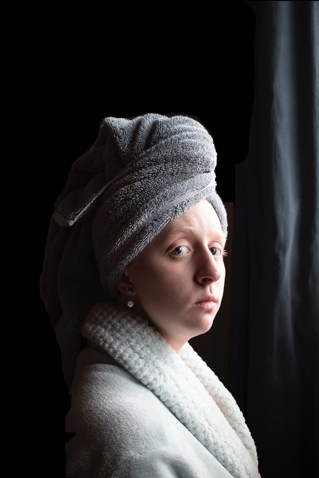 (Jennifer Brunt  |  courtesy @coronaartcollective) A self-portrait photograph by Jessica Brunt, modeled on Johannes Vermeer's 17th century painting "Girl With a Pearl Earring," is one of the works displayed on the Instagram account @coronaartcollective, an online space for artists to show their work while stuck at home because of the coronavirus pandemic.