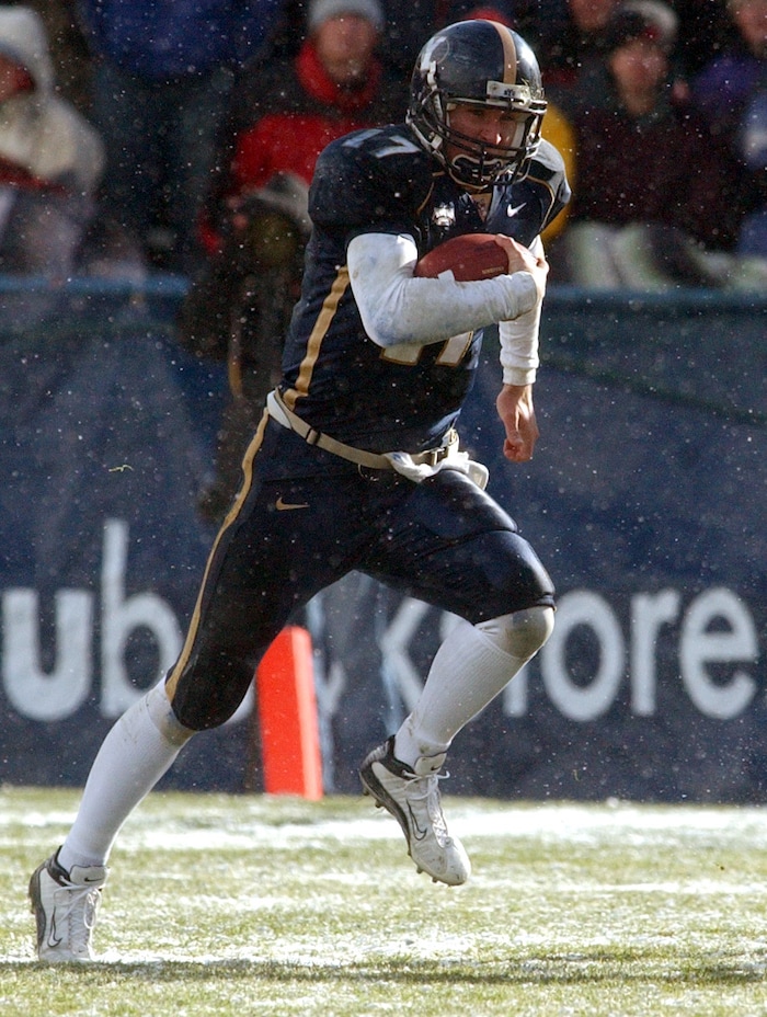 (Rick Egan  |  Tribune file photo)  BYU QB Jackson Brown runs the ball for the Cougars. BYU lost 3-0  to the Utes on Saturday November 22, 2003 at LaVell Edwards Stadium.