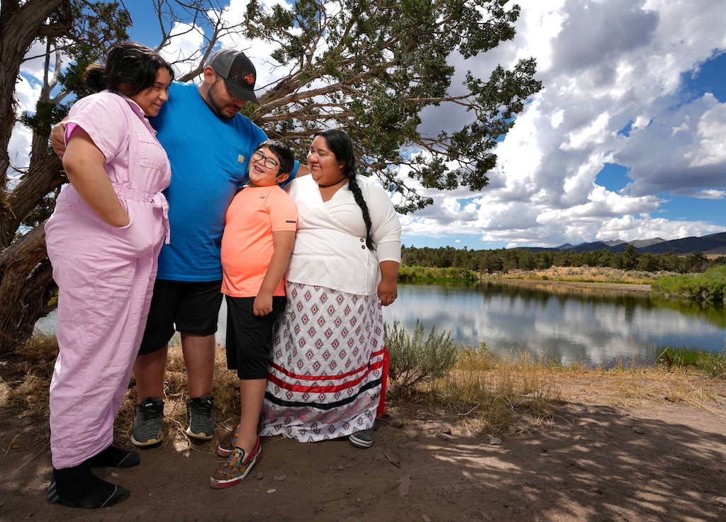 (Leah Hogsten | The Salt Lake Tribune) Tamra Borchardt-Slayton, right, Indian Peaks Band chairperson of the Paiute Indian Tribe of Utah and her family, husband Mike Slayton, daughter Chanel and son Carver pose for a photo at Indian Creek, Saturday, August 12, 2023.
