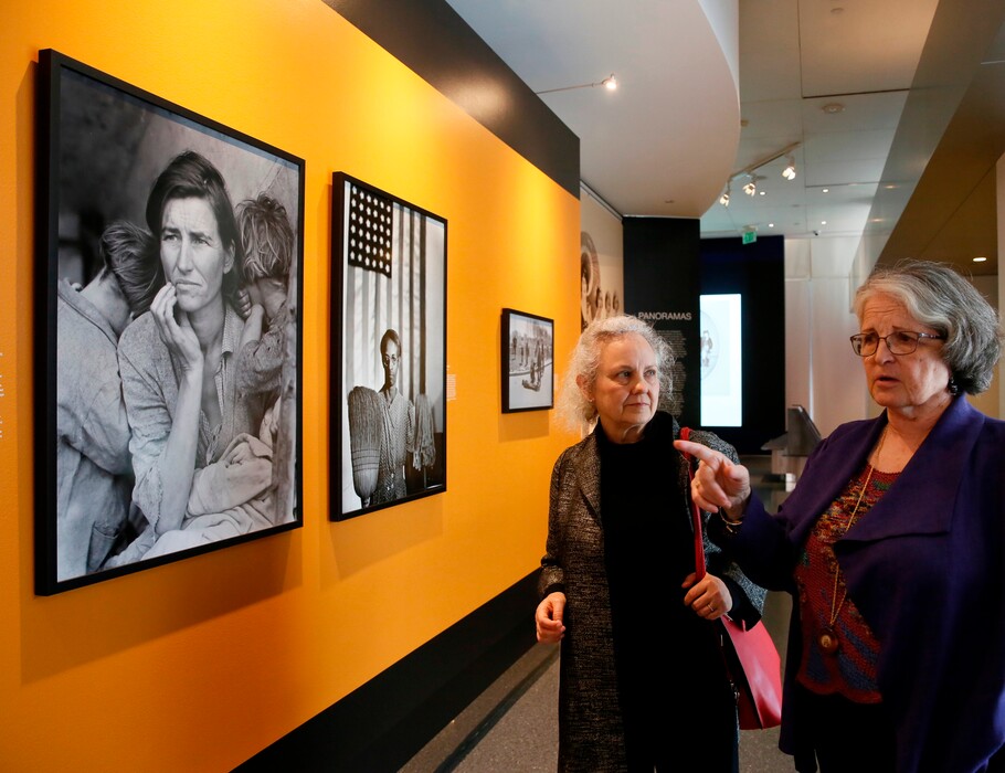 (Damian Dovarganes | AP photo)

This April 19, 2018, photo shows Library of Congress photo curator Beverly Brannan, left, and exhibition curator Anne Wilkes Tucker talk about "Migrant Mother," Dorothea Lange's moving portrait of a destitute farmworker photographed in 1936 at a pea-pickers camp near Nipomo, Calif.