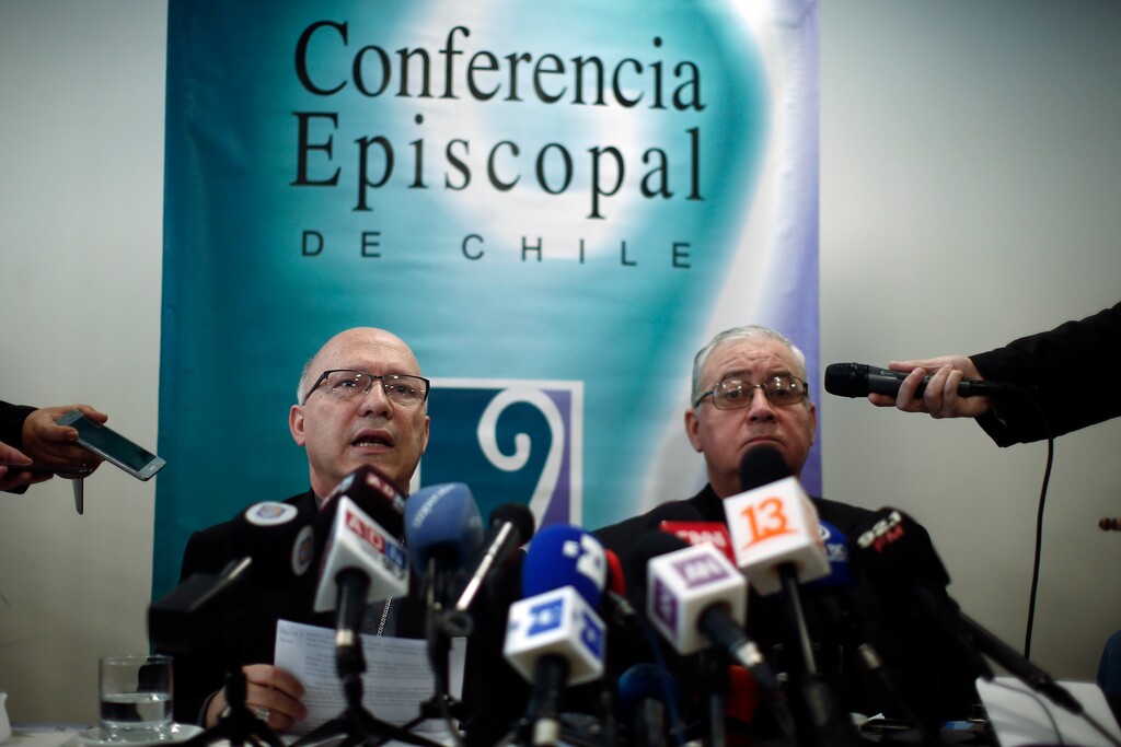 (AP Photo/Luis Hidalgo) Catholic Priests Fernando Ramos, left, and Juan Ignacio Gonzalez, spokespersons for the Episcopal Conference, speak to the press about a letter from Pope Francis in Santiago, Chile, Thursday, May 31, 2018. Pope Francis became the first pope to publicly denounce a "culture of abuse and cover-up" in the Catholic Church, saying Thursday in a pastoral letter to the Chilean faithful, that he was ashamed that neither he nor Chile's Catholic leaders truly ever listened to victims as the country's abuse scandal spiraled.