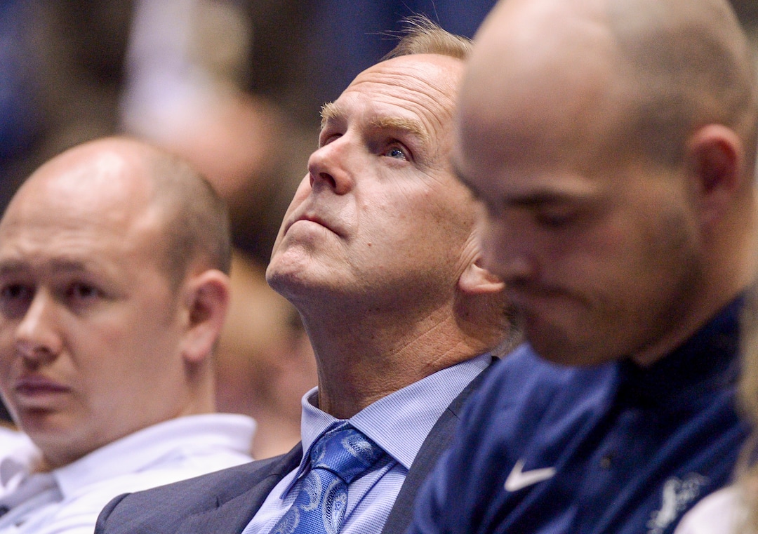 Leah Hogsten  |  The Salt Lake Tribune  BYU athletic director Tom Holmoe listens as BYU basketball coach Dave Rose talks about his career. Rose announced on Tuesday that he was retiring after a 14-year career in which he became BYUÕs all-time winningest menÕs basketball coach.