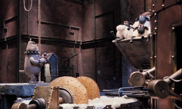 ( Courtesy Aardman Animation) Preston the dog (left) feeds many sheep, along with our heroes, into a nasty shearing machine in the 1995 animated short "Wallace & Gromit: A Close Shave."