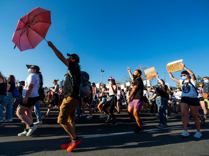 (Rick Egan  |  The Salt Lake Tribune)  Protesters  dance in downtown Salt Lake City, during the Dance Dance Revolution protest for racial equality, on Sunday, Aug. 9, 2020.