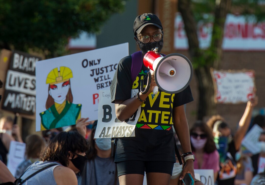 (Rick Egan  |  The Salt Lake Tribune)     Angela Johnson leads the crowd during a demonstration in Salt Lake City, on Wednesday, June 10, 2020.