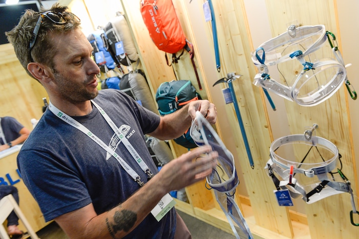 Francisco Kjolseth | The Salt Lake Tribune
Charlie Boas, an exhibitor for Utah based, Blue Ice North America talks about their lightweight harness called the Choucas Light, the lightest harness you can put on while still wearing your skis. Like many in the outdoor industry, Boas is not happy the Outdoor Retailer trade show is leaving for Colorado.