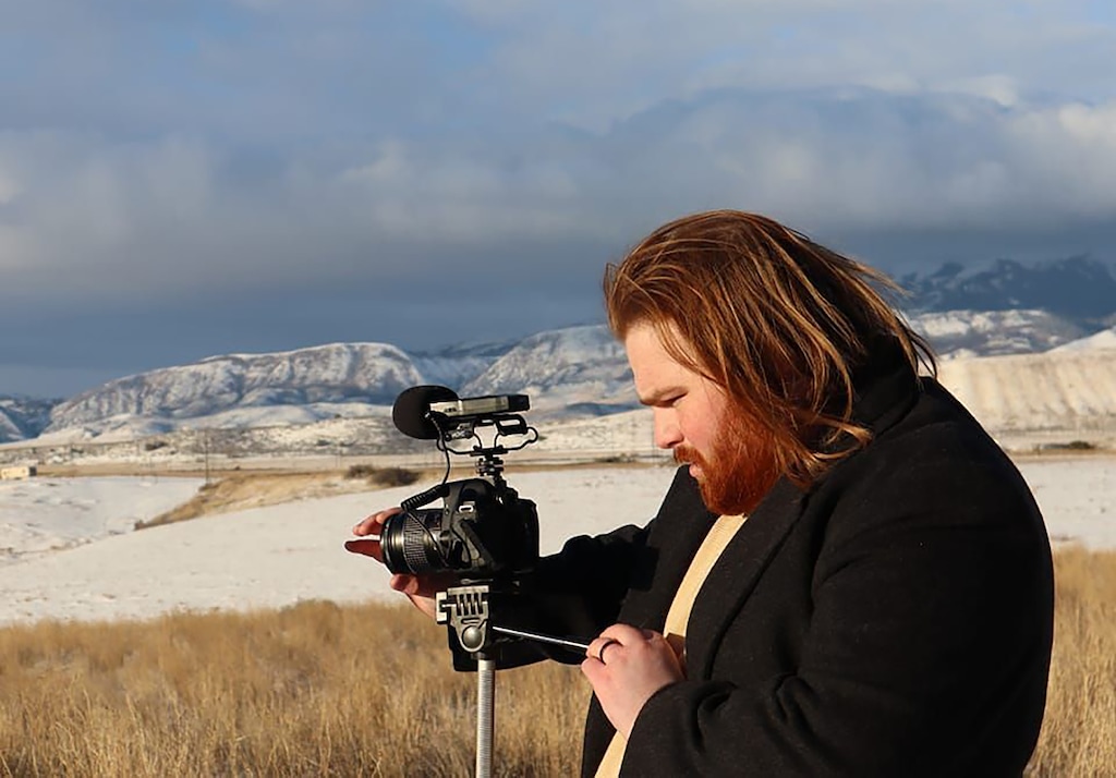 (Kaden Francis) Brock Marchant records a video near the Bear River Massacre site in southern Idaho.