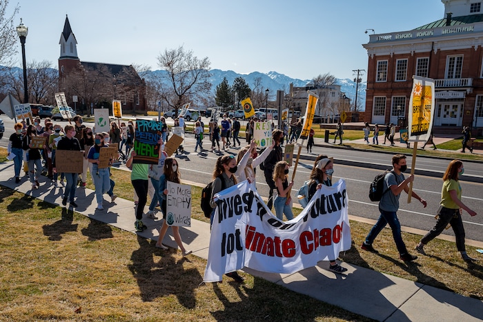 (Trent Nelson | The Salt Lake Tribune) Students march to the state Capitol in Salt Lake City to protest inaction on the climate crisis on Friday, March 19, 2021.