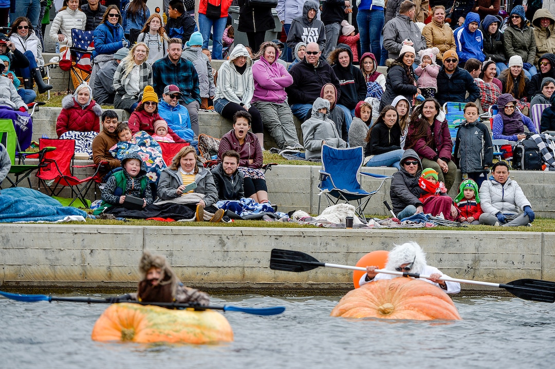 (Leah Hogsten  |  The Salt Lake Tribune) Pumpkin regatta bystanders cheer for the competitors during the annual Giant Pumpkin Regatta, October 19, 2019 on Oquirrh Lake in Daybreak, South Jordan.