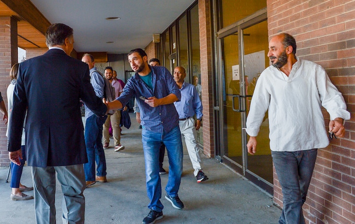Leah Hogsten  |  The Salt Lake Tribune  Republican U.S. Senate candidate Mitt Romney is thanked by members of the Utah Islamic Center, Oct. 26, 2018 after speaking to the Muslim community prior to Friday special prayers.