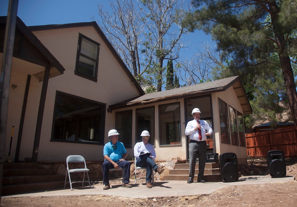 (Chris Caldwell | The Spectrum via AP) Community members commemorate the start of construction on what will be the Springdale History and Visitor Center Thursday, May 6, 2021, in Springdale, Utah. A former motel built with wood from Zion National Park will be rebuilt as the Springdale History Center, a museum dedicated to the legacy of the national park’s gateway town.