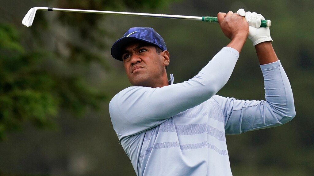 Tony Finau watches his tee shot on the third hole during the final round of the PGA Championship golf tournament at TPC Harding Park Sunday, Aug. 9, 2020, in San Francisco. (AP Photo/Jeff Chiu)