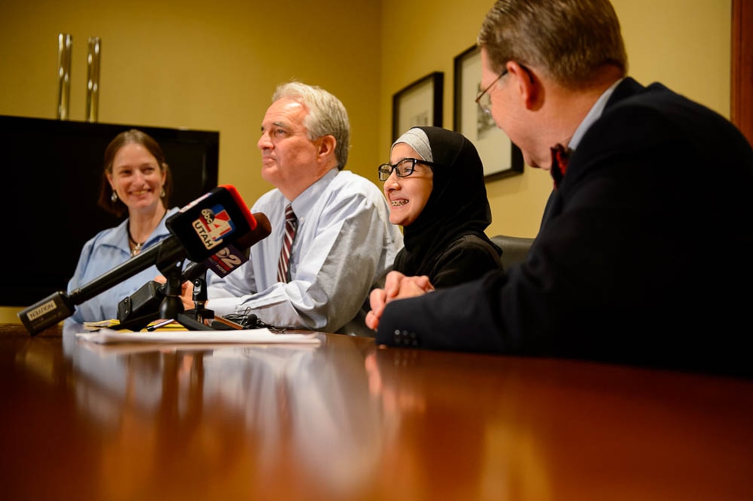 (Trent Nelson | The Salt Lake Tribune)  The Refugee Justice League, a group of attorneys that provide pro-bono work for refugees in Utah, held a news conference tomorrow to discuss a letter they are sending to school districts asking them to adopt best practices to better handle reports of students bullying/singling out refugee students for their religious clothing, in Murray on Thursday Nov. 15, 2018. At center is Maram Al-Shammari, an 11-year-old Muslim girl, who recounted her experience of having her hijab pulled off her head at school. Left to right are Marynell Hinton, Dr. McKell Withers, Al-Shammari, and James McConkie.
