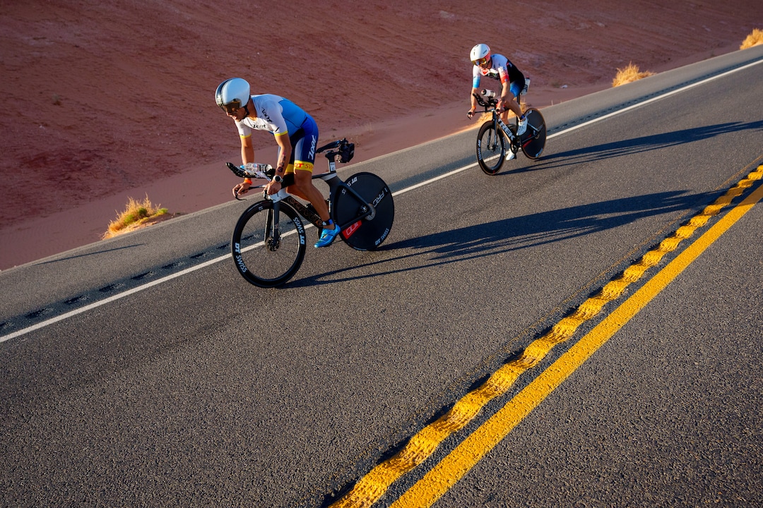 (Trent Nelson  |  The Salt Lake Tribune) 43 and 8 Kevin Portmann and Bart Aernouts compete in the Ironman World Championship triathlon in St. George on Saturday, May 7, 2022.