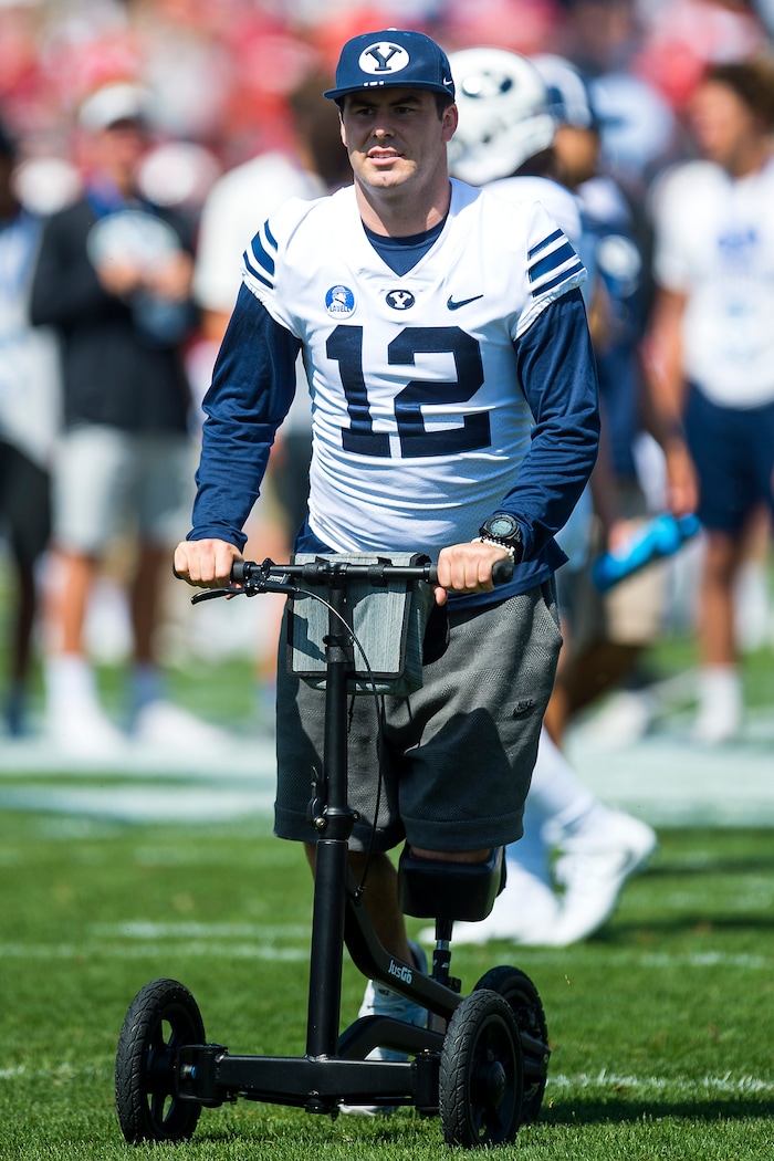 (Chris Detrick  |  The Salt Lake Tribune)   Brigham Young Cougars quarterback Tanner Mangum (12) watches practice before the game at LaVell Edwards Stadium Saturday Saturday, September 16, 2017. 