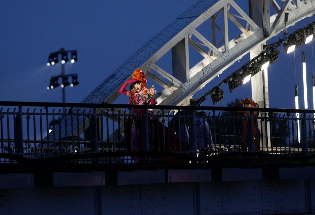 (Tsvangirayi Mukwazhi | AP) Drag queens prepare to perform on the Debilly Bridge in Paris, during the opening ceremony of the 2024 Summer Olympics, Friday, July 26, 2024.