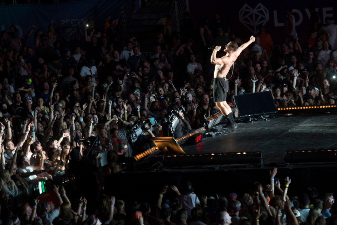 (Rick Egan  |  The Salt Lake Tribune)     Dan Reynolds performs with Image Dragons at the Loveloud Festival at Rice-Eccles Stadium, Saturday, July 28, 2018.