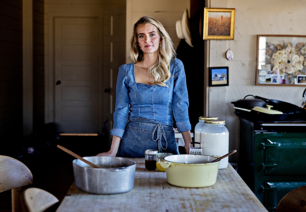 (Kim Raff | The New York Times) Hannah Neeleman at her and her husband’s dairy farm, Ballerina Farm, in Kamas, Utah, Nov. 7, 2024. Neeleman’s picture-perfect life as a Mormon farm wife has made her a social media star and a cultural lightning rod.