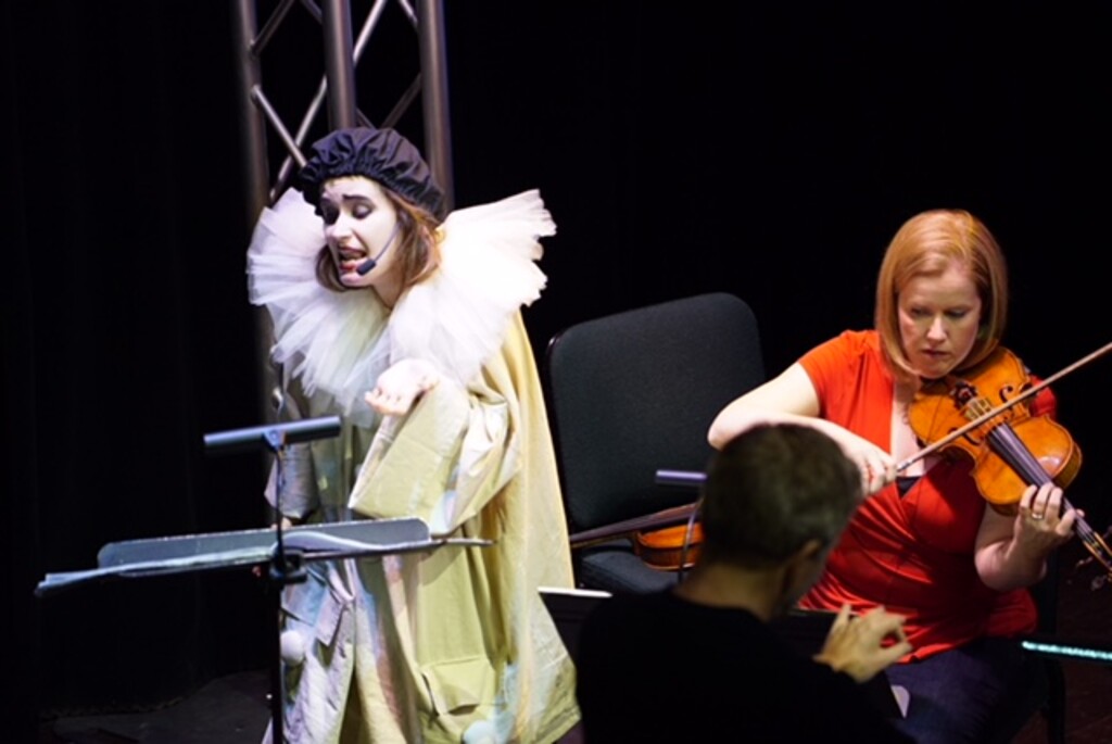 (Photo courtesy of Kathleen Sykes | Utah Symphony) Dressed as a clown, Patricia Kopatchinskaja performs "Pierrot Lunaire" at SKY SLC with Utah Symphony music director Thierry Fischer and orchestra members including concertmaster Madeline Adkins (in red top). Kopatchinskaja also performed the Alban Berg Violin Concerto with the orchestra in Abravanel Hall on Oct. 20 and 21.