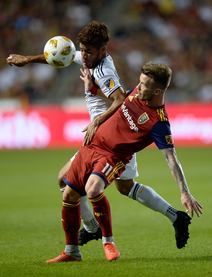 (Francisco Kjolseth  |  The Salt Lake Tribune)  Los Angeles Galaxy forward Ola Kamara (11) battles Real Salt Lake midfielder Sunday Stephen (8) during the first half of the MLS soccer match Saturday, Sept. 1, 2018, in Sandy at Rio Tinto Stadium.