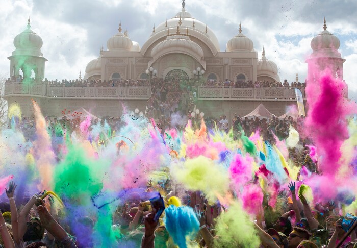 (Rick Egan  |  The Salt Lake Tribune)     Colors fly during the 22nd annual Holi Festival of Colors at the Sri Sri Radha Krishna Temple in Spanish Fork, Saturday, March 24, 2018.