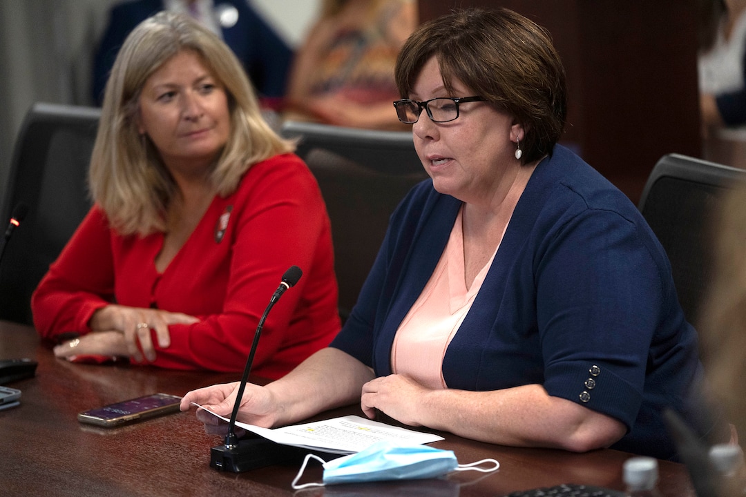 (Rick Egan | The Salt Lake Tribune)  UEA president Heidi Mathews listens as  Sara Jones, UEA Director of Education Excellence and Government Relations speaks, during a public hearing on the Utah State Board's recent rules for teaching about racism in the K-12 classroom at the State Board of Education in Salt Lake City, on Thursday, July 22, 2021.
