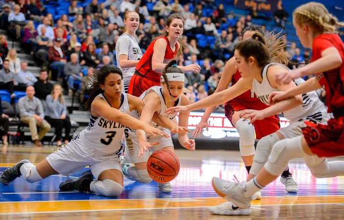 (Trent Nelson | The Salt Lake Tribune)  Skyline's Kiana Eskelson (3) and Skyline's Lauryn Crofts (4) chase down a loose ball as Skyline faces Springville in the 5A High School Girls' Basketball Tournament at SLCC in Taylorsville, Wednesday Feb. 21, 2018.