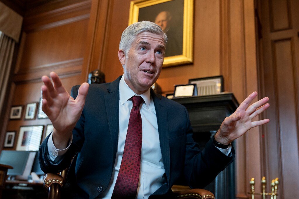 (J. Scott Applewhite | AP file photo)

 In this Sept. 4, 2019, photo, Justice Neil Gorsuch speaks during an interview in his chambers at the Supreme Court in Washington.