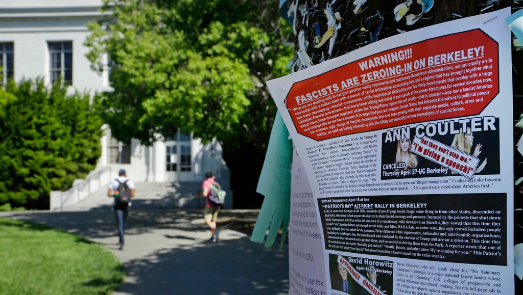 FILE - In this April 21, 2017, file photo, a leaflet is seen stapled to a message board near Sproul Hall on the University of California at Berkeley in Berkeley, Calif. The Trump administration is throwing its support behind a lawsuit against the University of California, Berkeley that accuses the school of a double standard for campus speakers that restricts conservative viewpoints. The U.S. Department of Justice said in a court filing on Thursday, Jan 25, 2018, that the allegations by the Berkeley College Republicans and Young America's Foundation would violate the First Amendment if proven true. (AP Photo/Ben Margot, File)